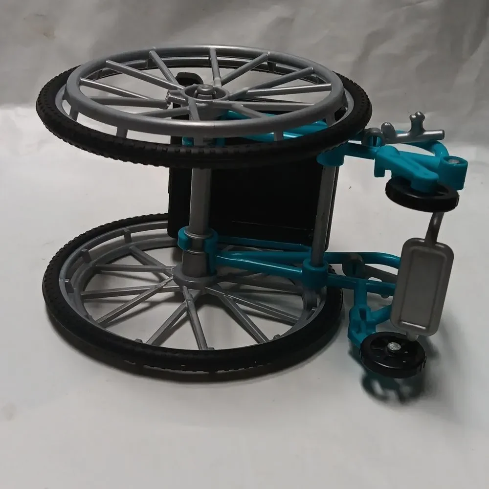Mattel 2018 Barbie Rolling Aqua Blue Wheelchair